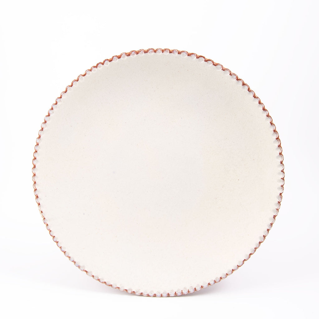 Assiette en faïence blanche