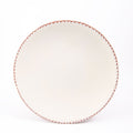 Assiette en faïence blanche