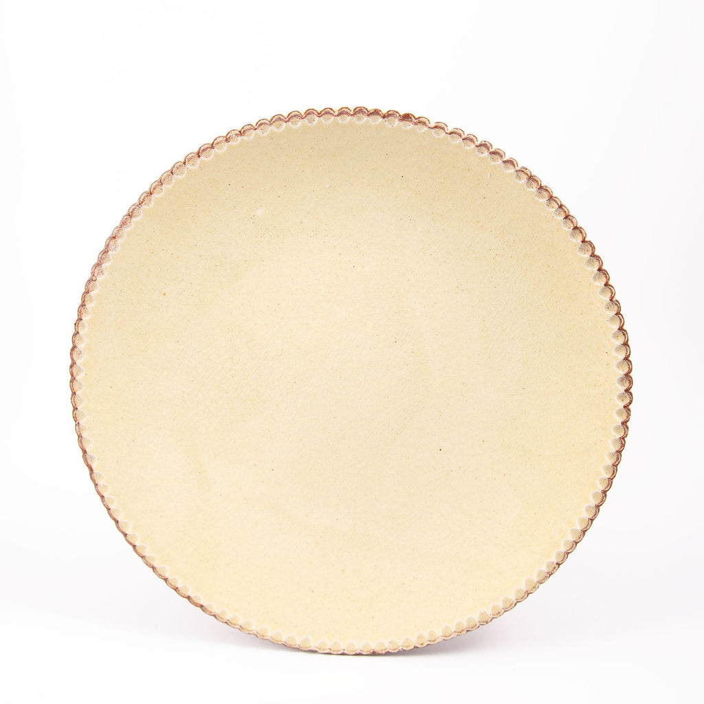 Assiette en faïence jaune